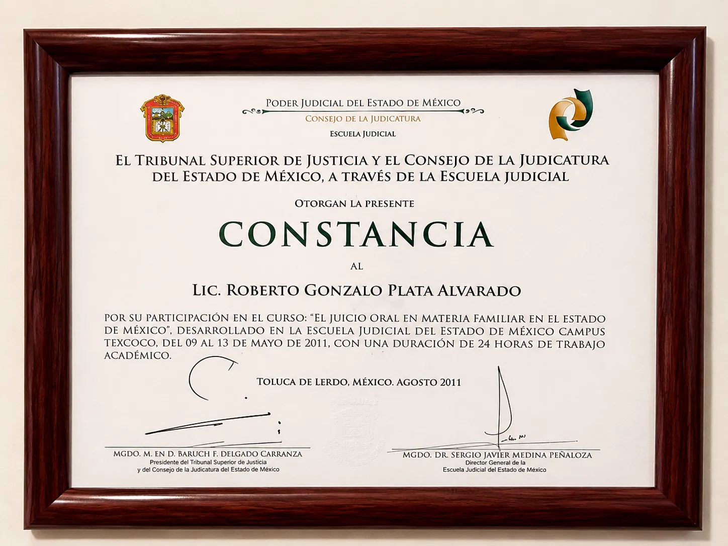 Constancia del curso sobre juicio oral en materia familiar impartido por la Escuela Judicial del Estado de México, campus Texcoco, 2011.